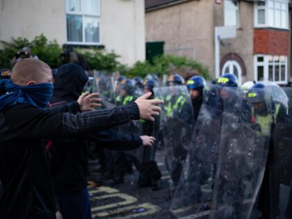 SOUTHAMPTON, UNITED KINGDOM - 2026/06/02: Men with face coverings confront police as viole