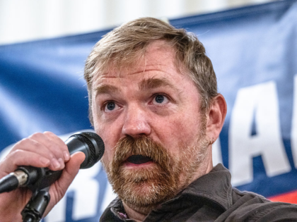 PORTLAND, MAINE - JUNE 07: Democratic U.S. Senate candidate Graham Platner speaks to voter