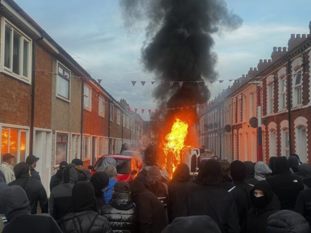 Vehicles set on fire by protesters on Lendrick Street in Belfast, as disorder flared in re