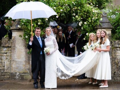 KEMBLE, ENGLAND - JUNE 06: Peter Phillips and Harriet Sperling depart with bridesmaids Geo