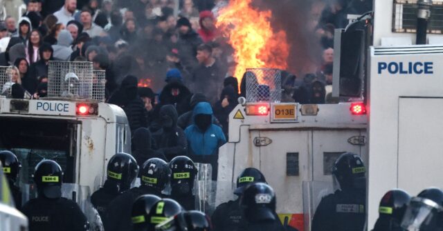 Northern Ireland Anti-Migration Rioters Clash with Police, Set Vehicles on Fire