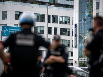 MONTREAL, CANADA - JUNE 22: Windows are allegedly shot out at the scene of an earlier acti