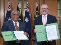 Australian Prime Minister Anthony Albanese (R) and Vanuatu's Prime Minister Jotham Napat p