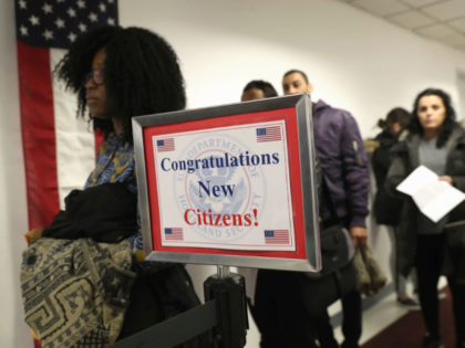 NEW YORK, NY - FEBRUARY 02: Immigrants wait in line to become U.S. citizens at a naturaliz