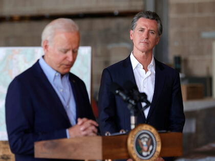 GettyImages1340139822 California Gov. Gavin Newsom (R) looks on as U.S. President Joe Biden delivers remarks to