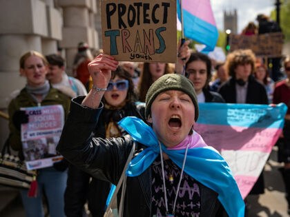Trans rights activists take part in a protest against the ban on hormone blockers on April