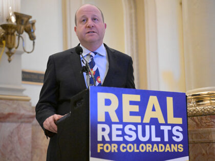 Gov. Jared Polis speaks during the press conference at Colorado State Capitol Building in