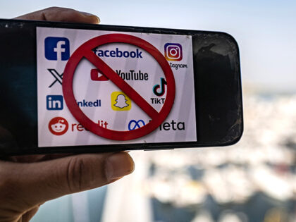 In this illustration photograph taken on June 18, 2026, in Dubai, a mobile phone displays