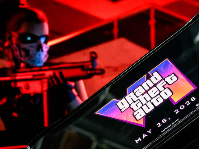 In this photo illustration, a phone displaying the Grant Theft Auto VI logo and new releas
