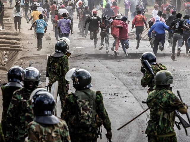 Kenya protests ebola quarantine center Demonstrators run for cover during clashes with Kenya police officers at a demonstration a