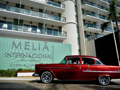 A car drives near the entrance of Melia International Hotel in Varadero, Matanzas Province