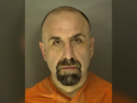 Cop Arrested for Allegedly Pointing Gun at Another Officer Who Microwaved Fish at Police Department