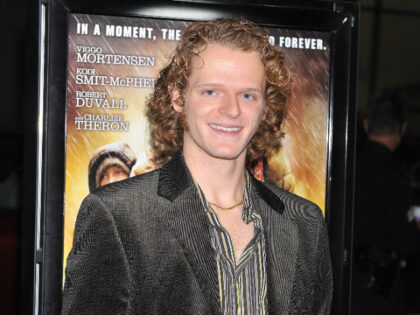 Actor Nick Pasqual arrives at the AFI premiere of "The Road", held at Grauman 