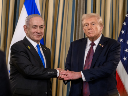 P20250929JB-0799 President Donald Trump and Israeli Prime Minister Benjamin Netanyahu shake hands after joi