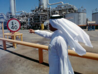 A Saudi official at the largest oil company on the Arabian peninsula, observe operations a