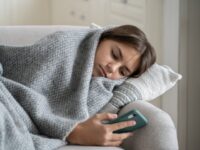 Social media addict scrolls TikTok