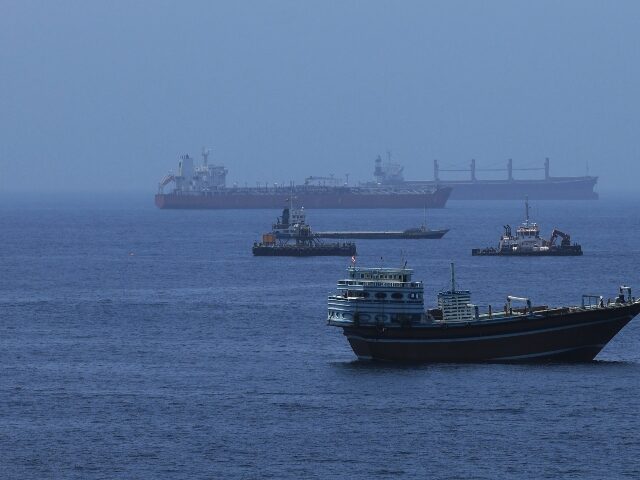 Strait of Hormuz A view of commercial cargo vessels and crude oil tankers are anchored in the Gulf of Oman,