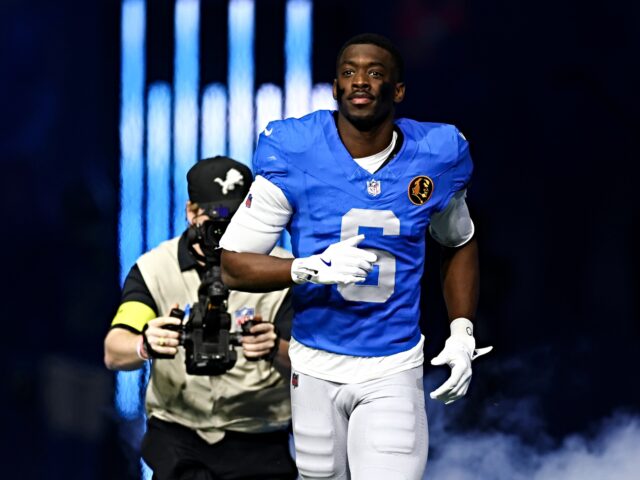 DETROIT, MICHIGAN - NOVEMBER 27: Terrion Arnold #6 of the Detroit Lions runs onto the fiel