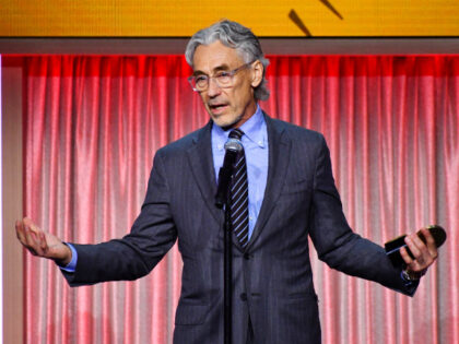 Tony Gilroy accepts an award onstage at the 86th Annual Peabody Awards held at the Beverly
