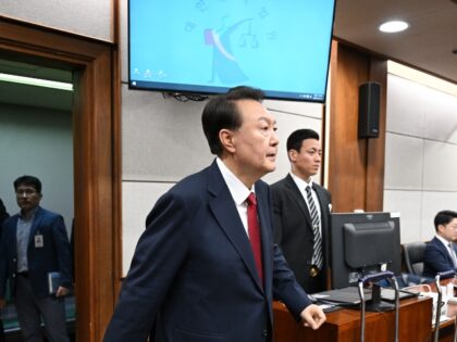 Former South Korean President Yoon Suk Yeol arrives for his criminal trial on insurrection