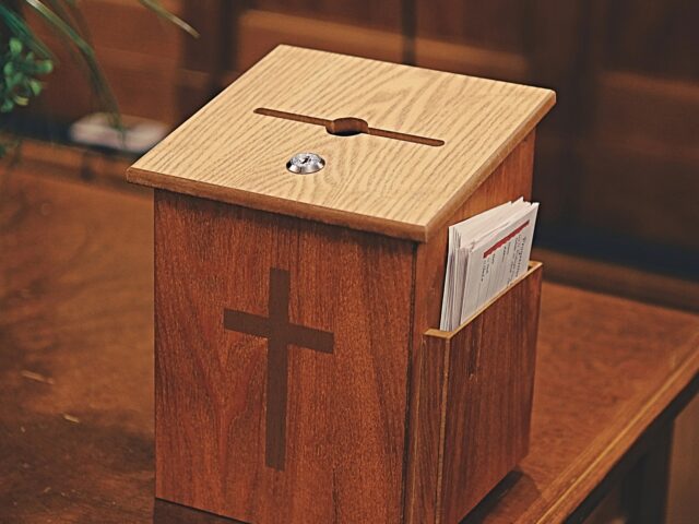 church offering box Police are searching for a man accused of stealing money from a church in New York City on