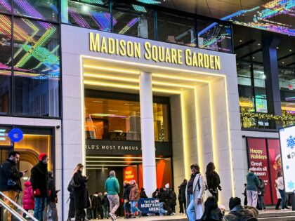 Crowd outside Madison Square Garden entrance at night, Seventh Avenue, Manhattan, New York