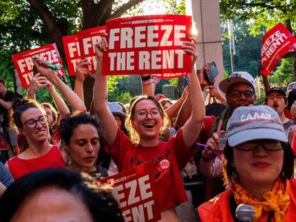 New Yorkers celebrate a vote by the Rent Guidelines Board to freeze rents in New York City