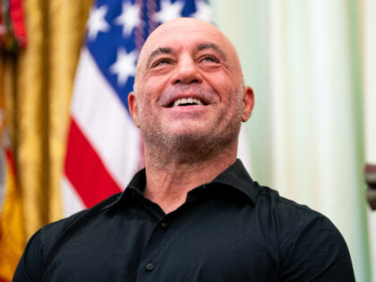 Media personality Joe Rogan during an executive order signing in the Oval Office of the Wh