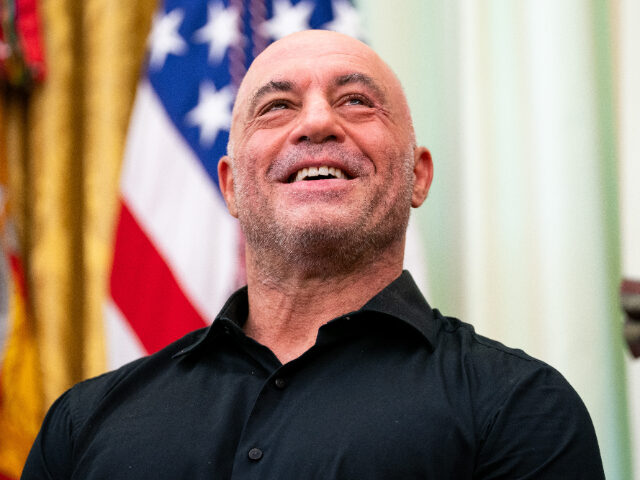 Media personality Joe Rogan during an executive order signing in the Oval Office of the Wh