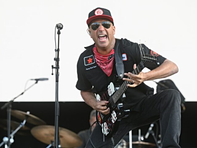 tom morrello CASTLE DONINGTON, ENGLAND - JUNE 14: (EDITORIAL USE ONLY) Tom Morello performs onstage dur