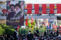 Washington says US, Iran pausing strikes, talks to proceed