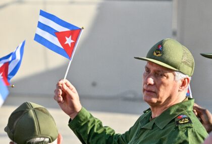 Cuba's President Miguel Diaz-Canel, seen here at a May 22 rally, is among those targe