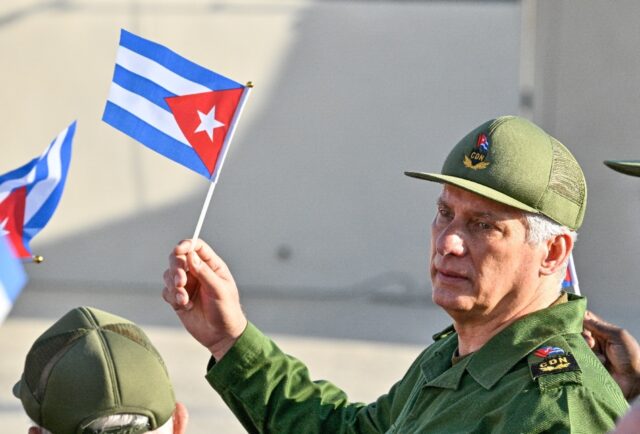 Cuba's President Miguel Diaz-Canel, seen here at a May 22 rally, is among those targe