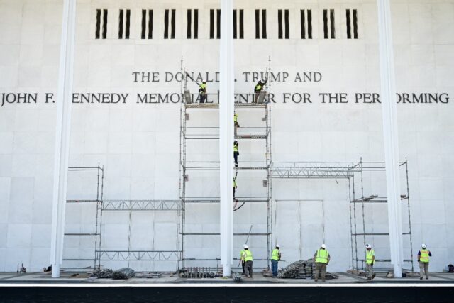 Workers erect scaffolding at the Kennedy Center, where a judge has ordered the removal of