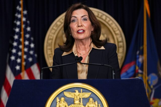 New York AI Law The Associated Press