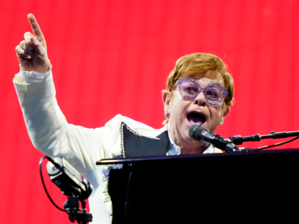 FILE - Elton John performs during his "Farewell Yellow Brick Road," tour, Friday