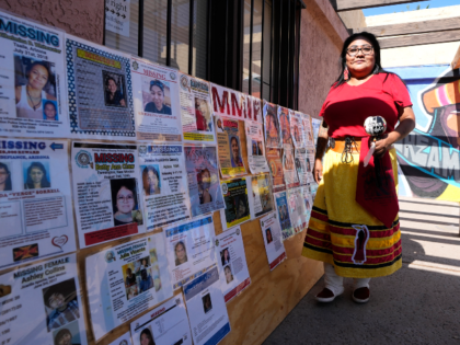 Grassroots advocate Reva Stewart walks outside the headquarters at Drumbeat Indian Arts, M
