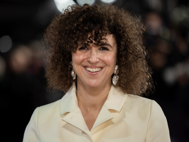 May El Toukhy poses for photographers upon arrival at the premiere for 'The Crown