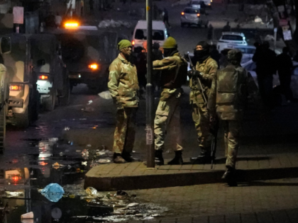 South African Defence Force members are deployed to Hillbrow, following a march against il