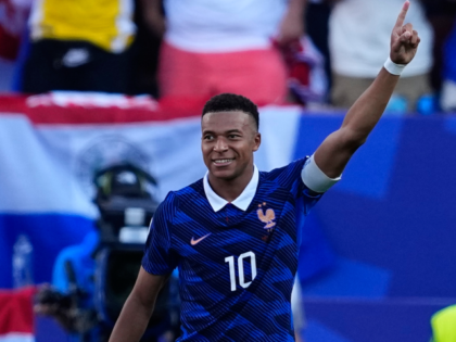 France's Kylian Mbappe (10) celebrates scoring his side's opening goal against P
