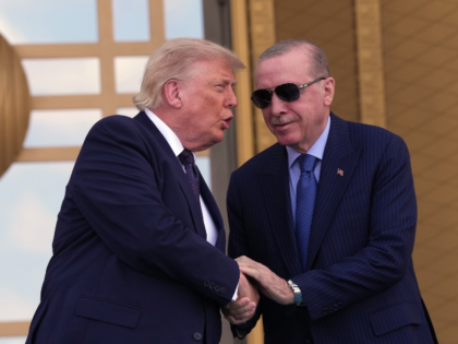 President Donald Trump, left, shakes hands with Turkish President Recep Tayyip Erdogan as