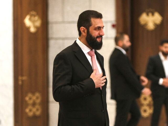 Syria's President Ahmed al-Sharaa arrives to receive UN Secretary-General Antonio Gut