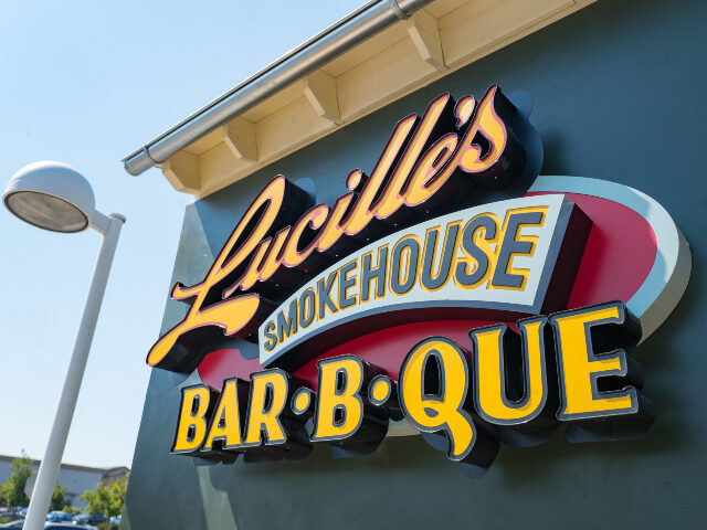 Barbecue restaurant Sign on facade at new Lucille's Barbecue restaurant in downtown Dublin, California, A