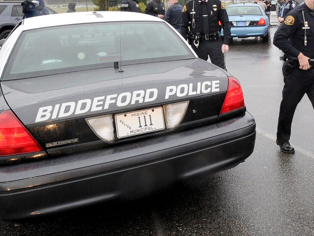 Police officers from across Maine assemble at Cabela's in Scarborough Wed. April24,20