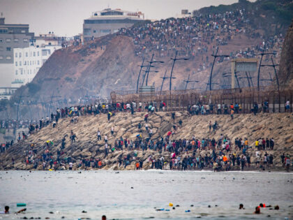 Migrants return to Morocco from the Spanish enclave of Ceuta, Friday, July 31, 2026. Anton