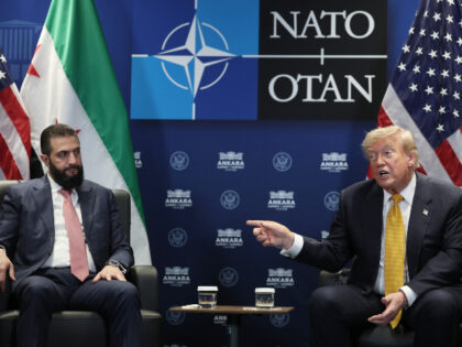 U.S. President Donald Trump (R) meets with Ahmed al-Sharaa, President of Syria (L) for bil