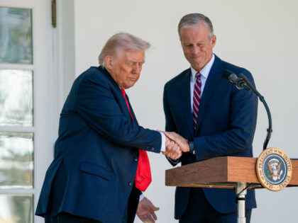 US President Donald Trump, left, and Senate Majority Leader John Thune, a Republican from