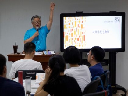 FILE - Pastor Ezra Jin Mingri leads a class on the basics of Christian beliefs at Zion Chu