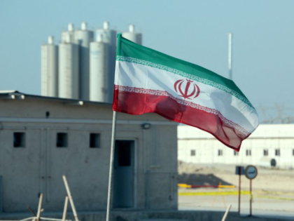 A picture taken on November 10, 2019, shows an Iranian flag in Iran's Bushehr nuclear powe