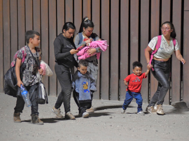 GettyImages-1242620537 SAN LUIS, AZ - August 20: Migrants attempting to cross in to the U.S. from Mexico are deta